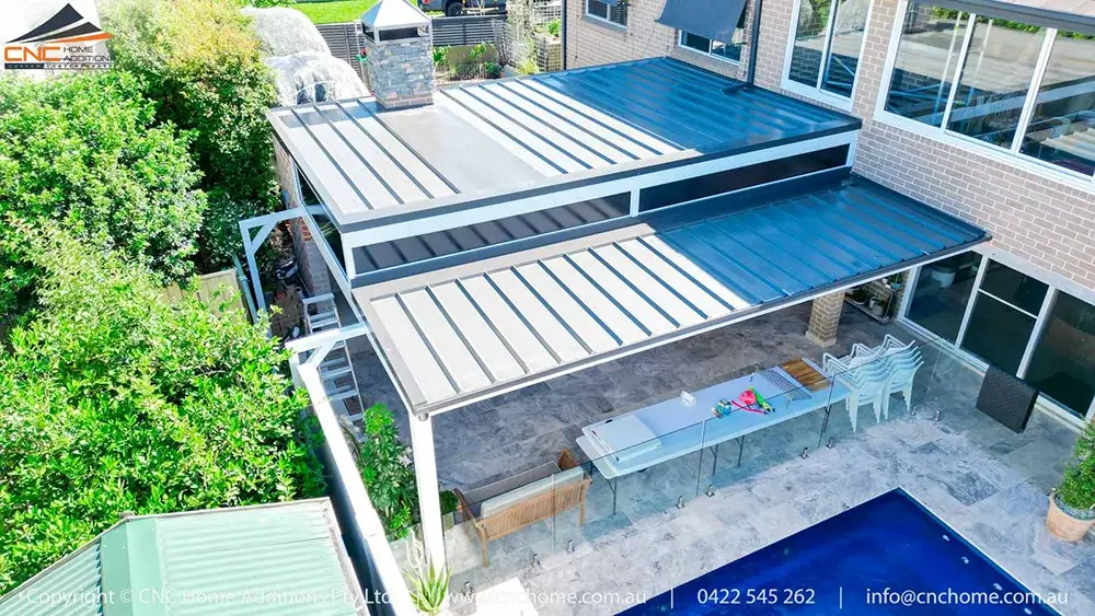 image1 Sleek Stratco Edge Gutters on Custom Patio Awning at Harrington Park Residence
